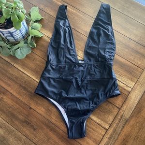 💛 2/$12 sale item 💛NEVER WORN Deep cut black one piece swimsuit, size M